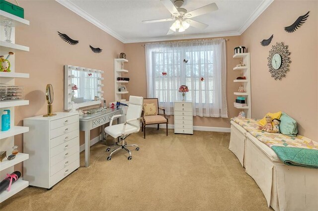 carpeted office space featuring ceiling fan and ornamental molding