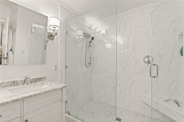 bathroom with crown molding, a stall shower, and vanity