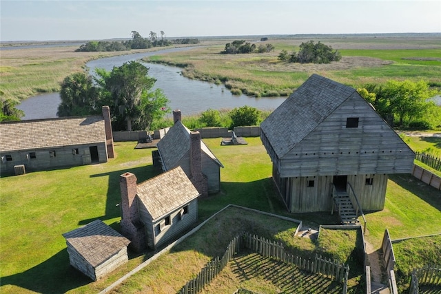 drone / aerial view featuring a rural view and a water view