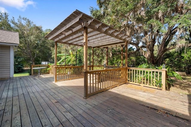 wooden deck featuring a pergola