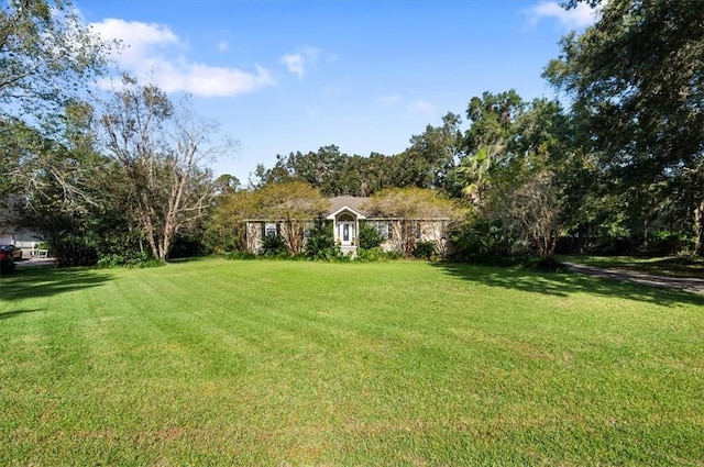 exterior space featuring a front lawn