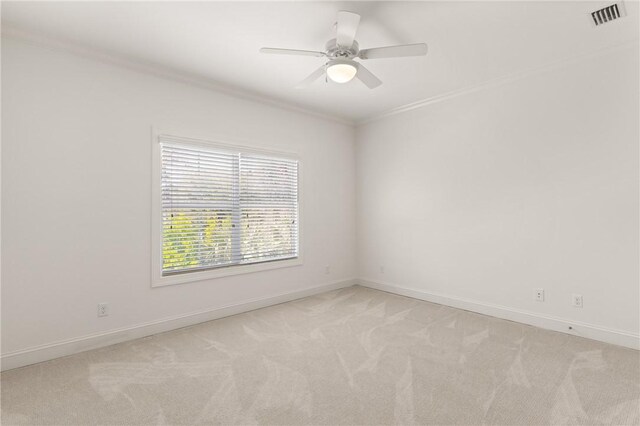 1040 Sinclair Pointe, Saint Simons Island, GA 31522 - laundry area with ornamental molding, independent washer and dryer, a sink, and cabinet space