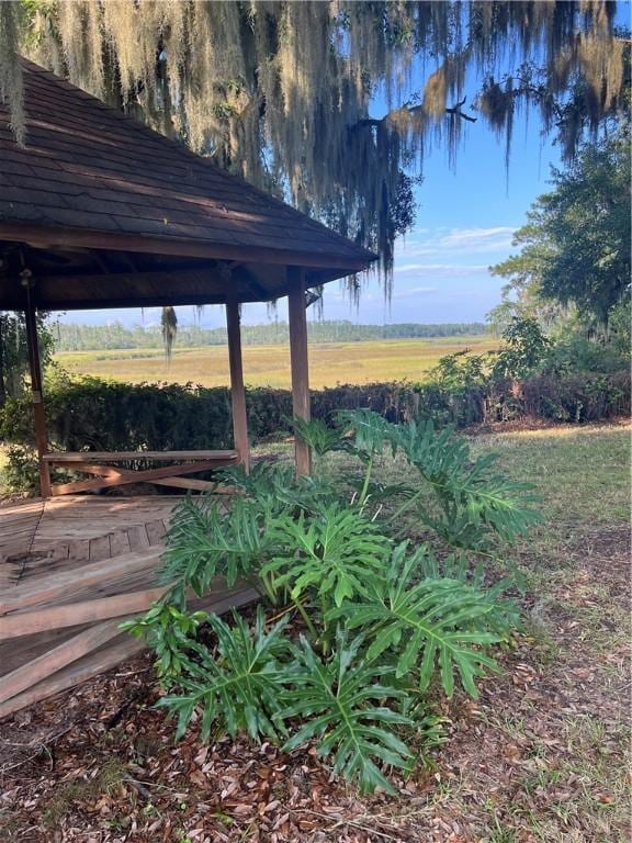 view of yard with a gazebo and a rural view