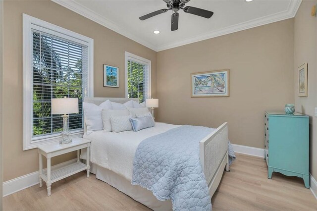 3100 Prince Ln, Saint Simons Island, GA 31522 - bedroom with light wood finished floors, ornamental molding, baseboards, recessed lighting, and ceiling fan