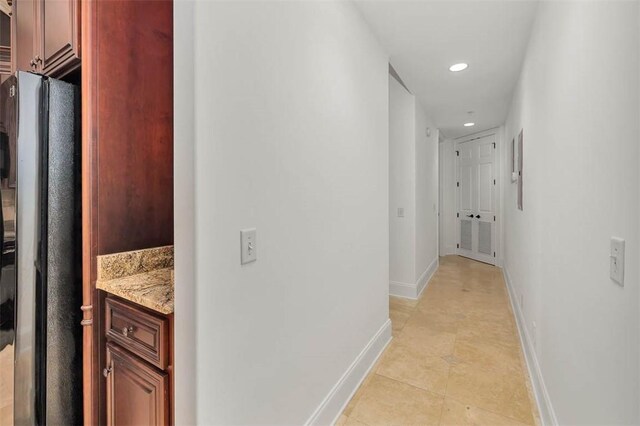 3100 Prince Ln, Saint Simons Island, GA 31522 - hall with recessed lighting, baseboards, and light tile patterned floors