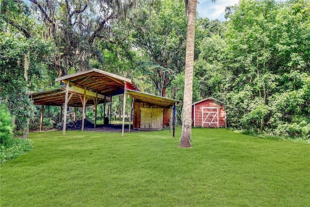 124 Ryals Rd, Brunswick, GA 31523 - view of grassy yard with a shed