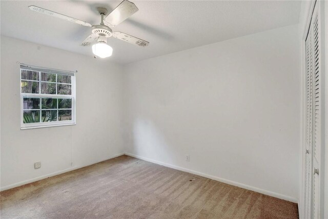 124 Ryals Rd, Brunswick, GA 31523 - unfurnished bedroom with carpet flooring, a closet, and ceiling fan