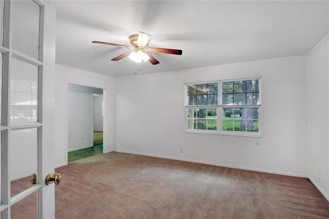124 Ryals Rd, Brunswick, GA 31523 - carpeted spare room with ceiling fan and baseboards