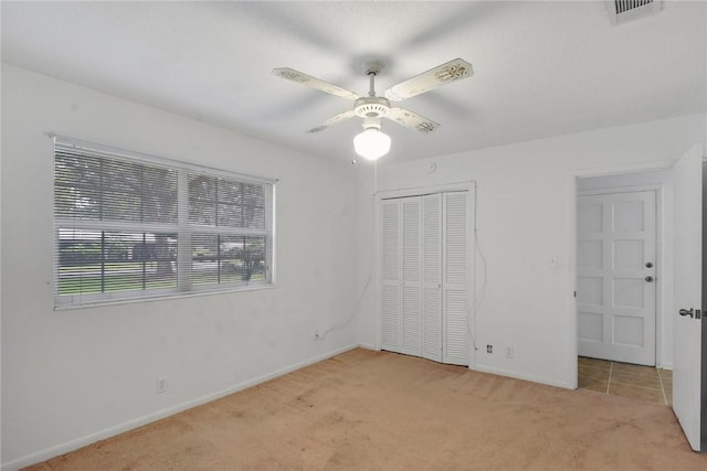 124 Ryals Rd, Brunswick, GA 31523 - unfurnished bedroom featuring carpet floors, a closet, and a ceiling fan