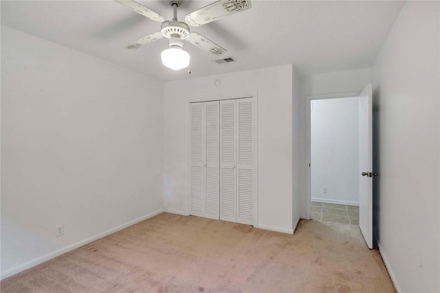 124 Ryals Rd, Brunswick, GA 31523 - unfurnished bedroom with light carpet, a closet, and ceiling fan