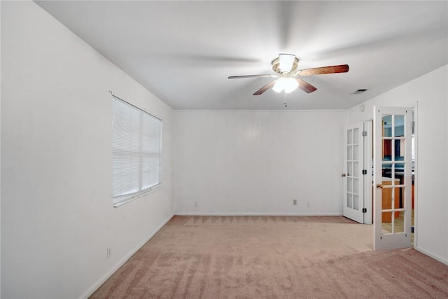 124 Ryals Rd, Brunswick, GA 31523 - spare room with french doors, carpet floors, and ceiling fan