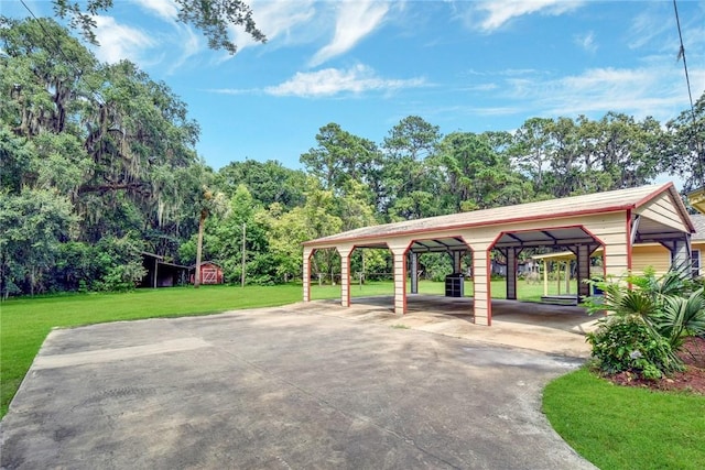 124 Ryals Rd, Brunswick, GA 31523 - surrounding community with a yard and driveway