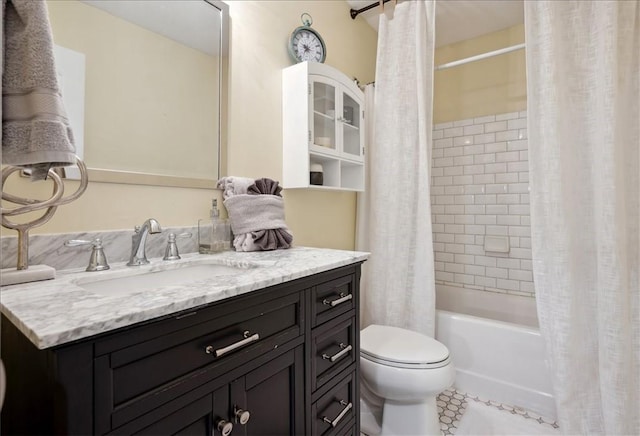 bathroom with toilet, shower / bath combo with shower curtain, vanity, and tile patterned floors