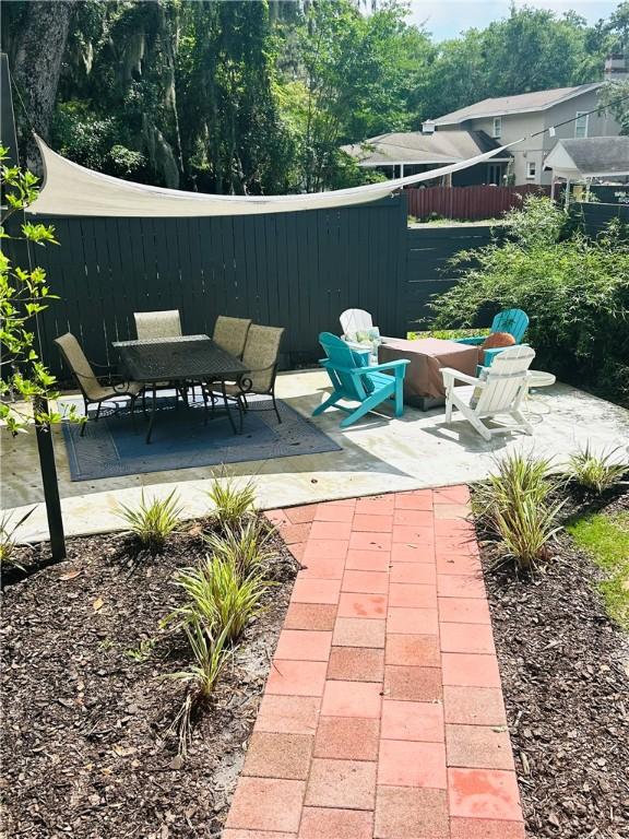 241 Broadway St, Saint Simons Island, GA 31522 - view of patio featuring an outdoor fire pit