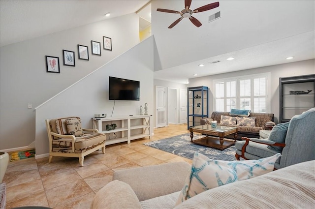 living room featuring a ceiling fan, baseboards, recessed lighting, and high vaulted ceiling