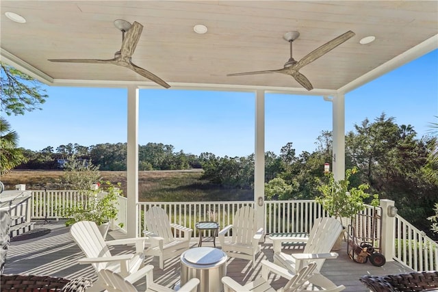 wooden terrace with ceiling fan