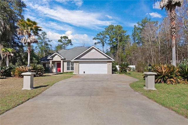 view of front facade with a front lawn and a garage