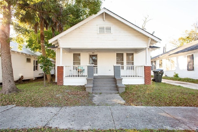 bungalow-style home with covered porch