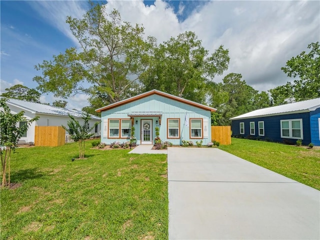 1007 Elbert Ext, Darien, GA 31305 - view of front of property featuring concrete driveway and board and batten siding