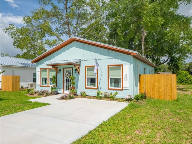 1007 Elbert Ext, Darien, GA 31305 - view of front of house featuring board and batten siding and cooling unit