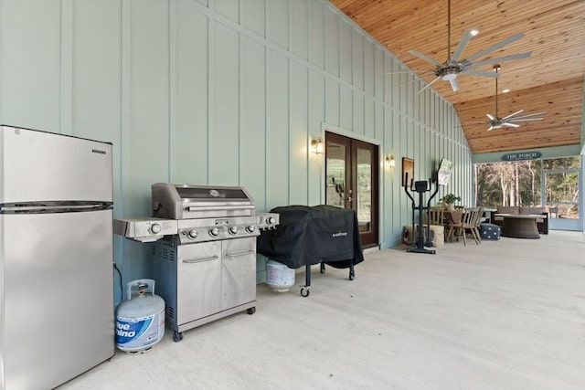 view of patio / terrace with french doors, area for grilling, and a ceiling fan