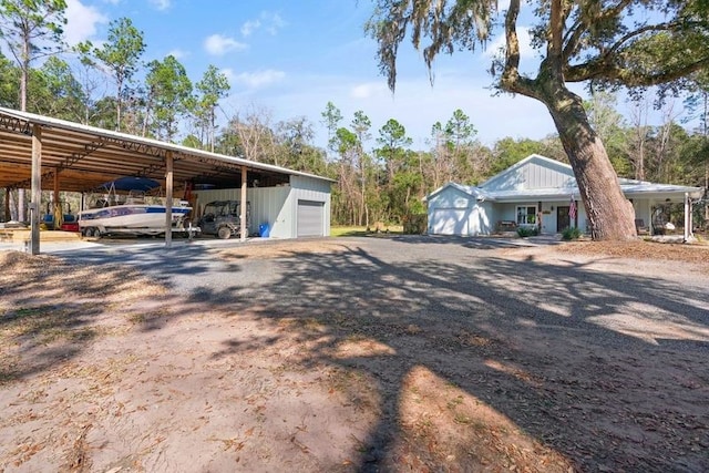 view of parking featuring a carport