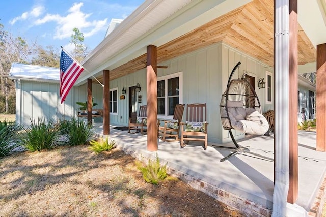 back of house with covered porch