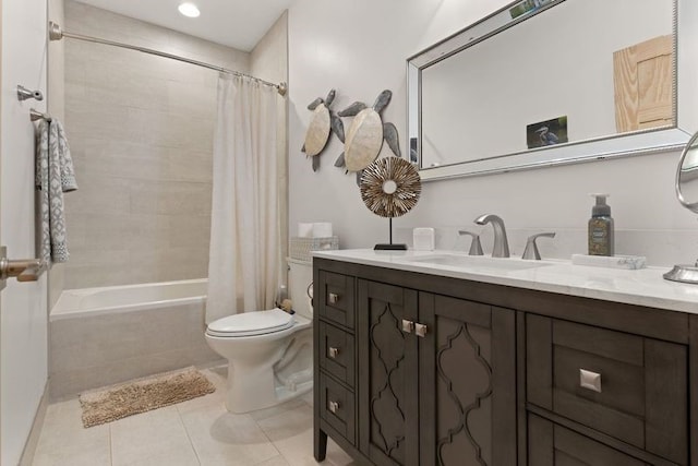 bathroom with shower / bath combo, vanity, toilet, and tile patterned floors