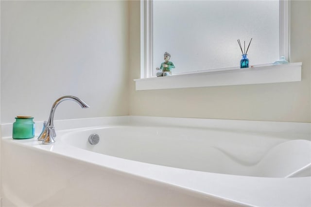 bathroom featuring a tub