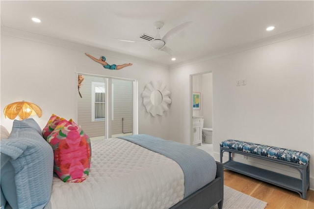 bedroom featuring ceiling fan, crown molding, connected bathroom, and light hardwood / wood-style flooring