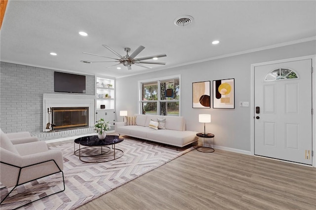 703 Wayne St, Darien, GA 31305 - living room with a ceiling fan, wood finished floors, recessed lighting, ornamental molding, and baseboards