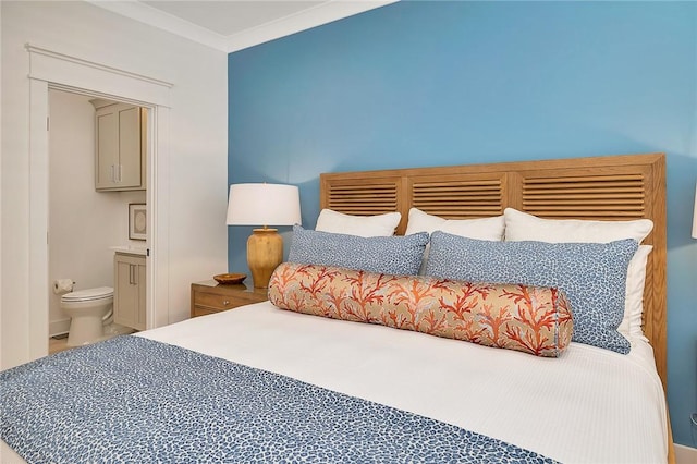 bedroom with ensuite bath and ornamental molding