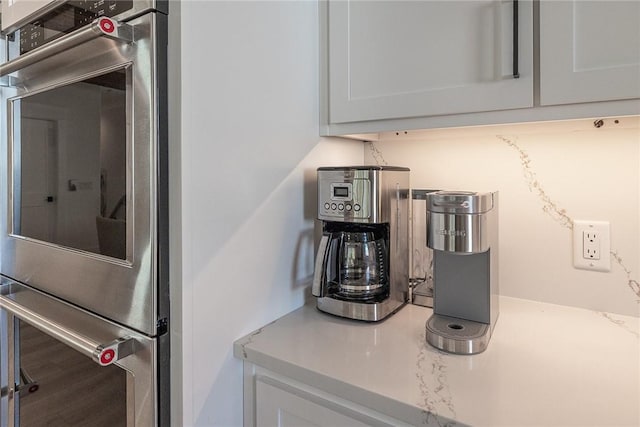 interior details featuring white cabinets