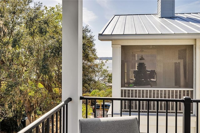 balcony featuring a water view