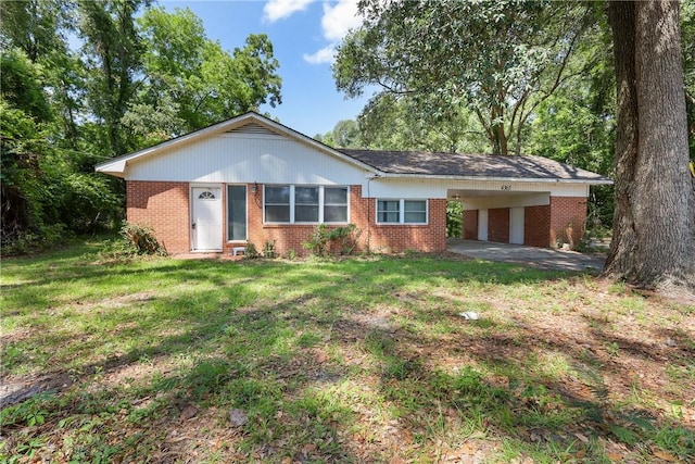 4365 US Highway 341, Jesup, GA 31545 - ranch-style house with brick siding, a front lawn, and an attached carport