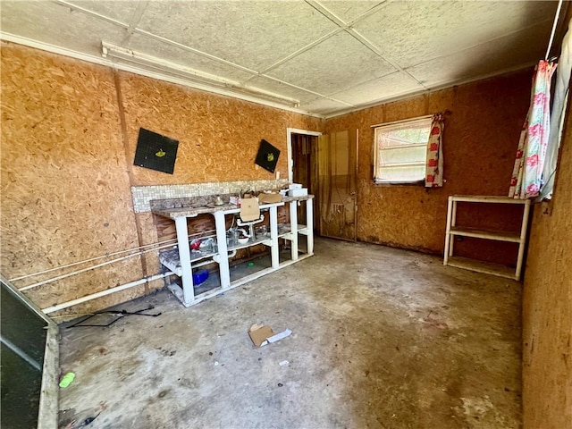 miscellaneous room featuring unfinished concrete floors