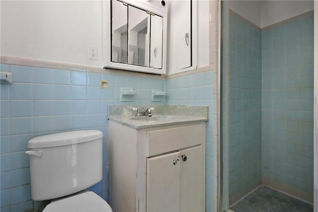 4365 US Highway 341, Jesup, GA 31545 - bathroom with tile walls, vanity, a shower stall, and wainscoting