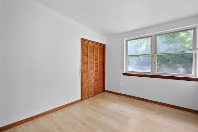 4365 US Highway 341, Jesup, GA 31545 - unfurnished bedroom with light wood finished floors and a closet