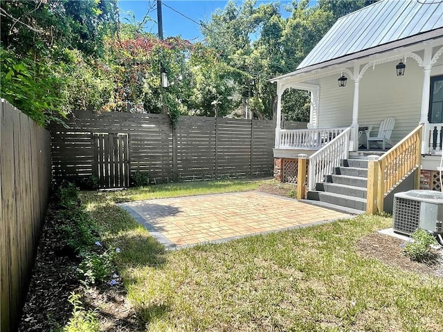 1915 Union St, Brunswick, GA 31520 - view of yard with central air condition unit and covered porch