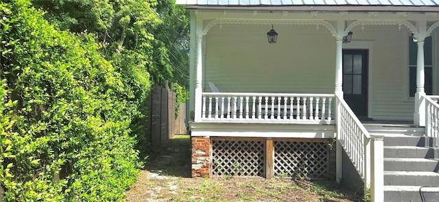 1915 Union St, Brunswick, GA 31520 - wooden terrace with covered porch, stairs, and fence