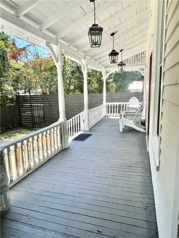 1915 Union St, Brunswick, GA 31520 - wooden deck with covered porch and fence