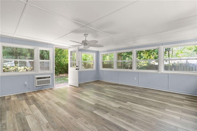 3120 Willow Ave, Brunswick, GA 31520 - unfurnished sunroom with a wooden deck, wood finished floors, and a wall mounted air conditioner