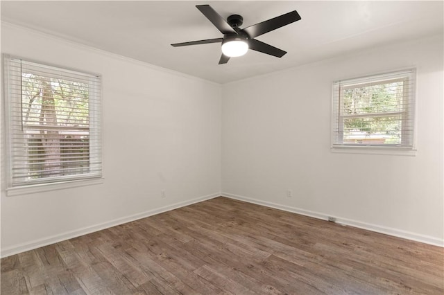 3120 Willow Ave, Brunswick, GA 31520 - spare room with plenty of natural light, wood finished floors, crown molding, a ceiling fan, and baseboards