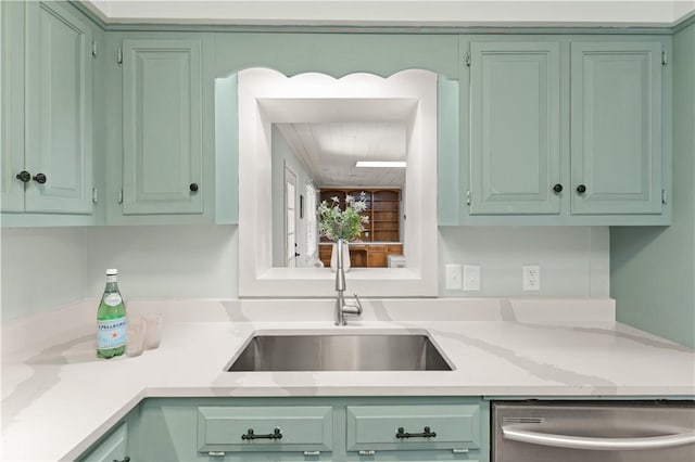 3120 Willow Ave, Brunswick, GA 31520 - kitchen with dishwasher, a sink, and green cabinets