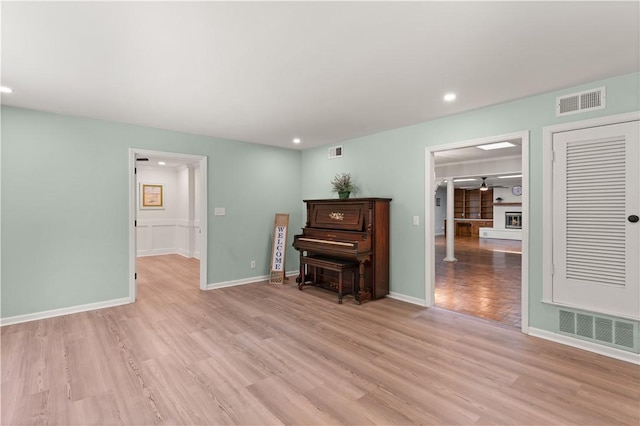 3120 Willow Ave, Brunswick, GA 31520 - living area featuring light wood-type flooring, recessed lighting, and baseboards