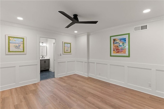 3120 Willow Ave, Brunswick, GA 31520 - unfurnished room featuring a decorative wall, ornamental molding, ceiling fan, light wood-type flooring, and recessed lighting