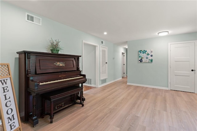3120 Willow Ave, Brunswick, GA 31520 - living area with light wood-style flooring, baseboards, and recessed lighting