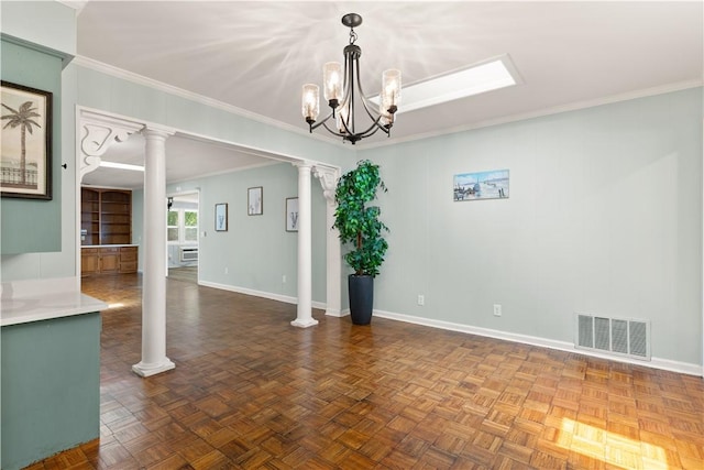 3120 Willow Ave, Brunswick, GA 31520 - unfurnished dining area featuring decorative columns, ornamental molding, baseboards, and a chandelier