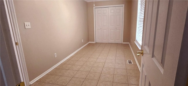 146 Don El St, Brunswick, GA 31523 - corridor with light tile patterned floors and baseboards