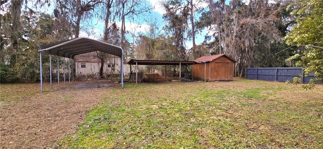 146 Don El St, Brunswick, GA 31523 - view of yard with a shed and a detached carport